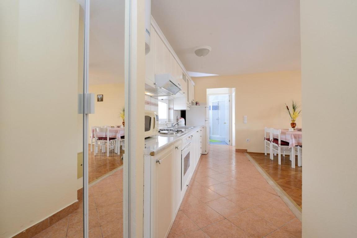 Apartment And Rooms Sidro Petrcane Bagian luar foto